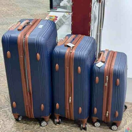 NEW Stylish 3-piece expandable luggage set in navy blue with brown accents!
